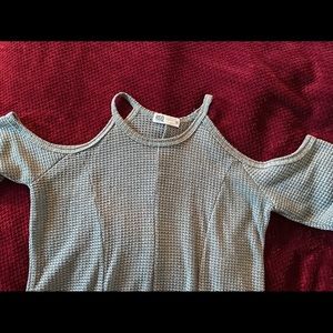 Adorable form fitting shoulderless shirt for sale